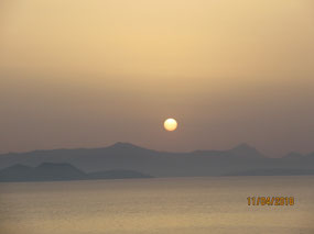 Hazy morning sunrise with sandstorm from Africa