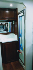Washing machine straight ahead, shower on the righ