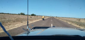 Two cyclists non electric doing the big lap