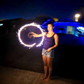 Jo twirling a sparkler on NYE
