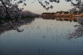 The mirror reflection of the moat at sunset