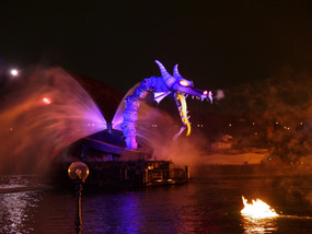 The witch summons the dragon to fight Mickey