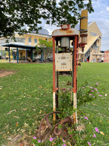 Old petrol pump out the back of the pub