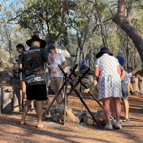 Making toast at the Outback Breakfast, Undara