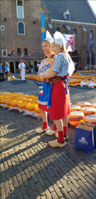 Girls selling cheese at the market