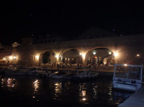 Port at night Arsenal Restaurant