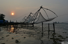 Chinese fish nets at sunset