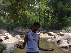 John, by the river.