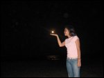 Mae holds the moon