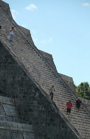 Workmen on El Castillo - The Castle