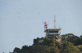 Signal station where boats radio their arrival