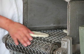 Machine made tortilla