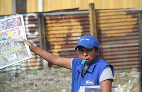 One of my fav photos: roadside newspaper boy