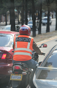 Bike regn no on helmet and hi vis jacket