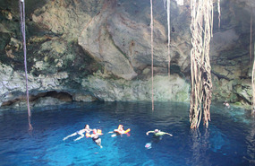 Swimming in a cenote, Merida, Mexico