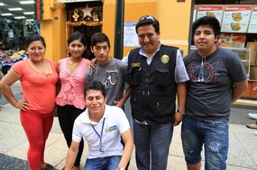 Eduar (front) with his cousin & family