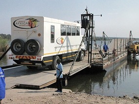 Two small ferries to cross the border