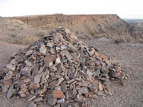 Travellers places a stone onto this pile