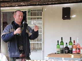 Sparkie explains his wine