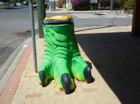 Dinosaur foot rubbish bin