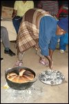 The Lesotho womans home - making bread