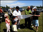 Tom explains our route to curious Mongols