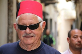 Dave very befitting in the local headwear!