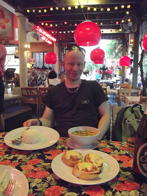 Marcus enjoying Thai meal
