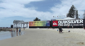 beach walking up to surfing competition