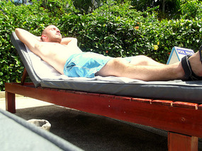 relaxing by pool
