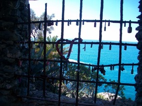 Lovers leave padlocks on the fence to seal their l
