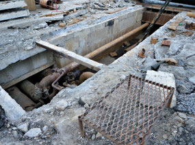 Just a Small Hole in the Footpath!