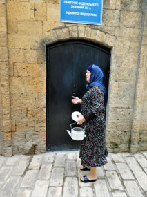 Friendly Woman Chats at the Museum