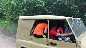 Car Packed with Passengers