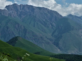 Suede Hills, Towering Mountains
