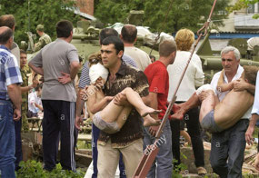 Rescuing Injured Children (c. CNN Library)