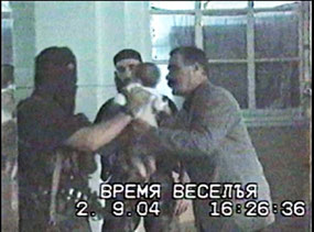 Ruslan Auschev Rescuing a Baby (c. CBS News)