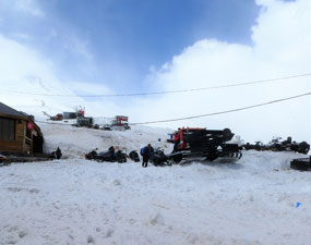 Snow Mobiles to the Summit