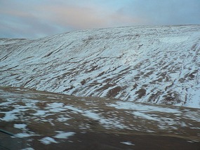 Snow Falls Heavily in a Forbidding Landscape