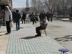 A Relaxed Shop Owner, Street Scene Tashkorgan
