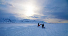 Snowmobiles on Adventfjord (c. Wikimedia Commons)