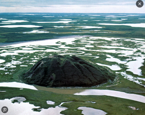 MacKenzie Lowlands and Pingo (c. Britannica)