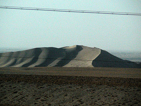 Eerie Grey Ghost Dunes on the Way to Keriya