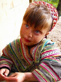 Green Eyed Child Looking Appealing, Courtesy Ishaq