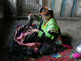Kalasha Woman Sewing Gowns