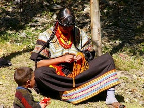 Kalasha Woman Embroiding*