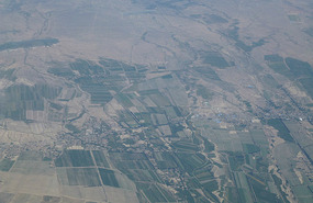 Cultivated Plots in the Dusty Desert Near Urumqi