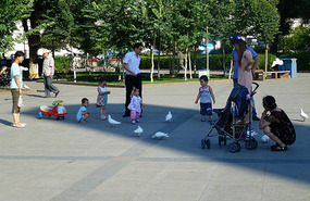 Families Relaxing in Renmin Park