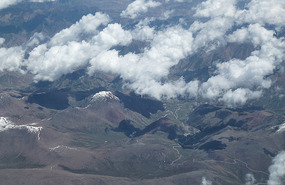 Flying Over Desolate Arid Land Toward Urumqi