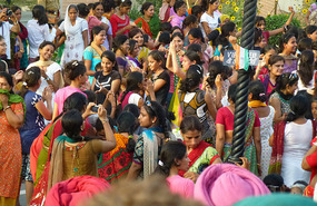 Women Dancing before the Parade